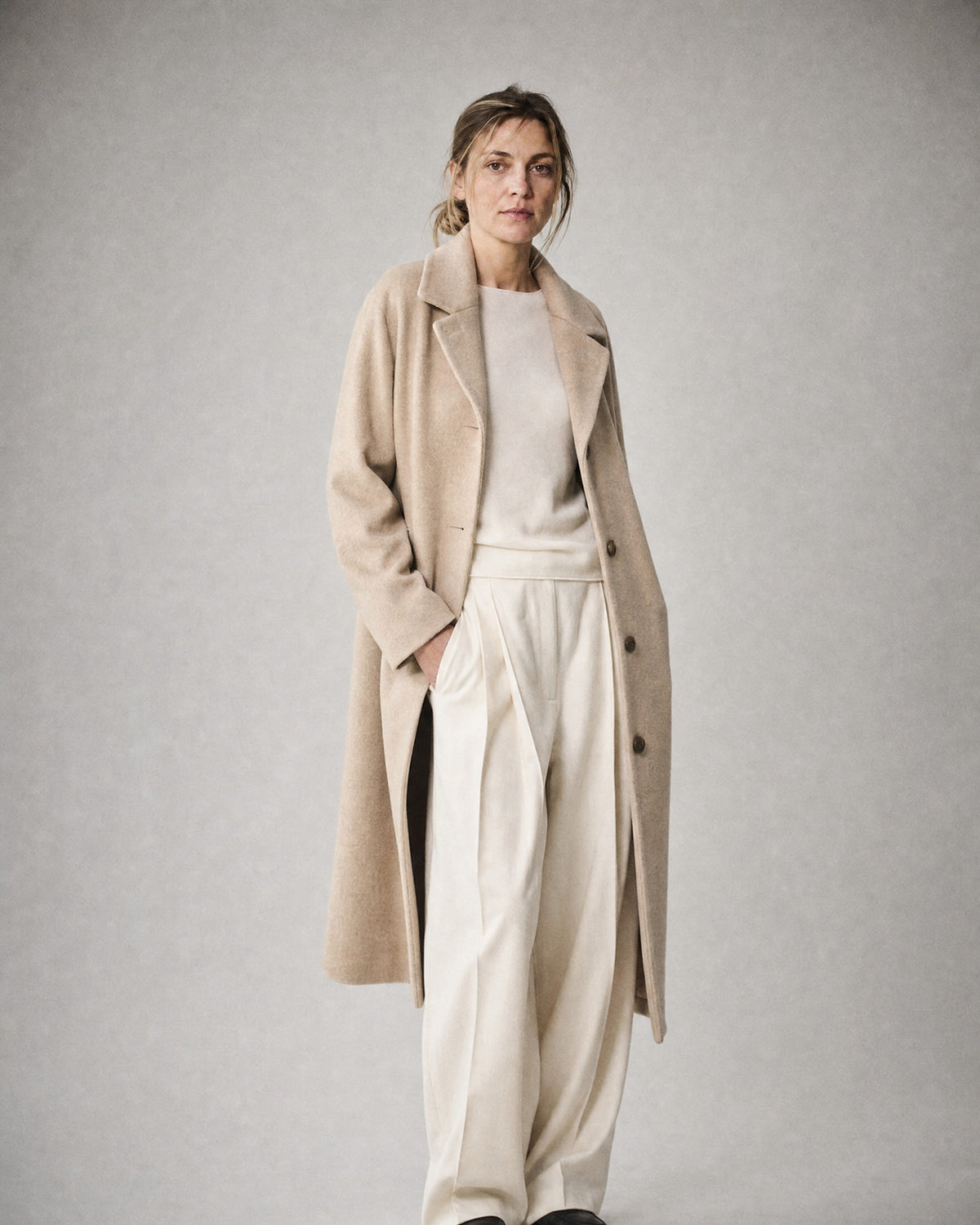 Women's Long Lapel Coat worn, three-quarter view | Belmorne