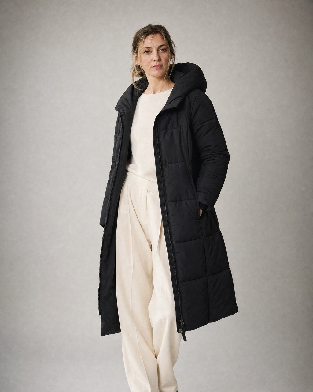 Women's Long Puffer Coat worn, three-quarter view | Belmorne