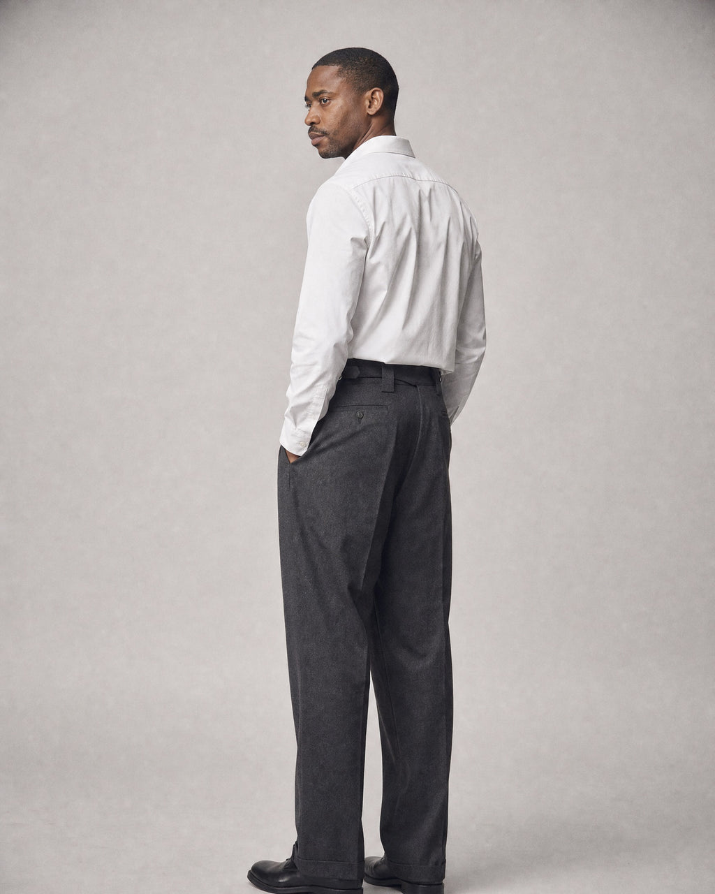 Men's Herringbone Pleated Trousers worn, back | Belmorne