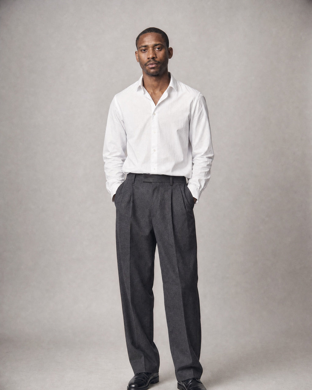 Men's Herringbone Pleated Trousers worn, front | Belmorne